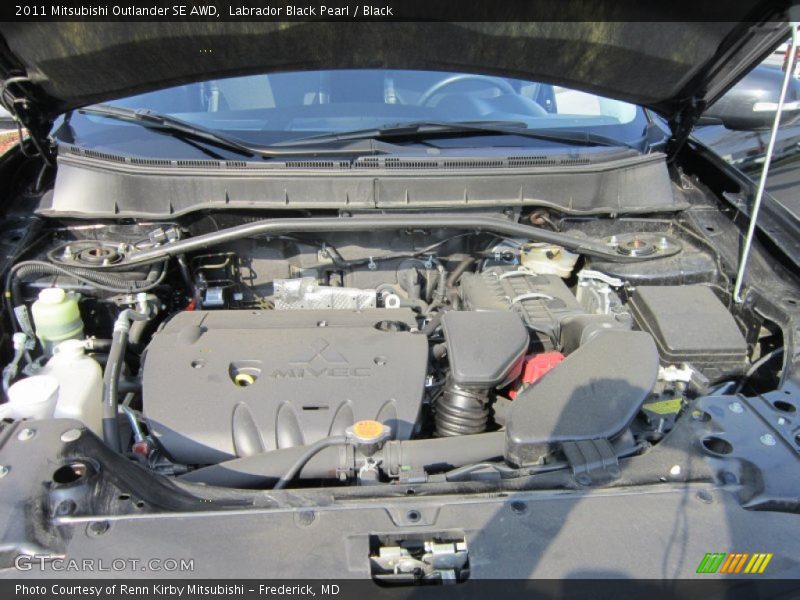 Labrador Black Pearl / Black 2011 Mitsubishi Outlander SE AWD