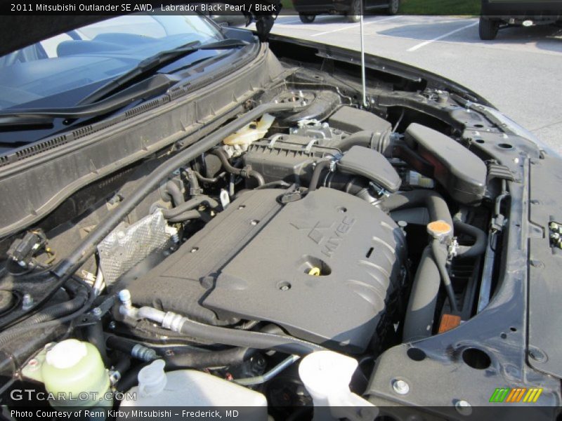 Labrador Black Pearl / Black 2011 Mitsubishi Outlander SE AWD