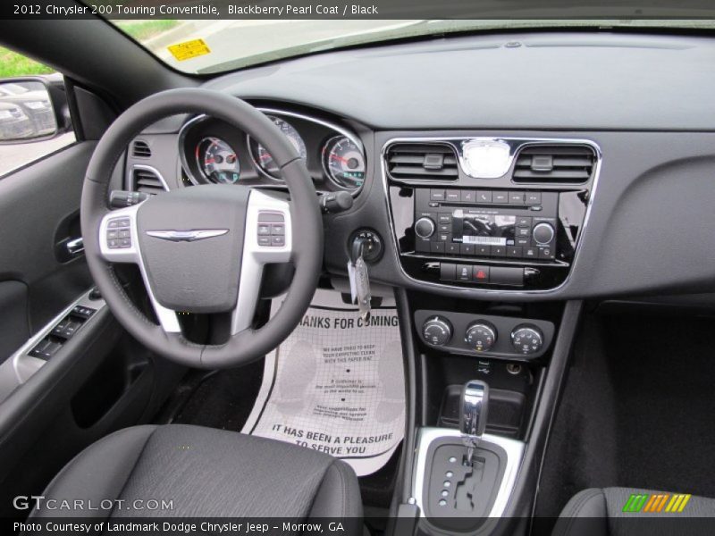 Dashboard of 2012 200 Touring Convertible