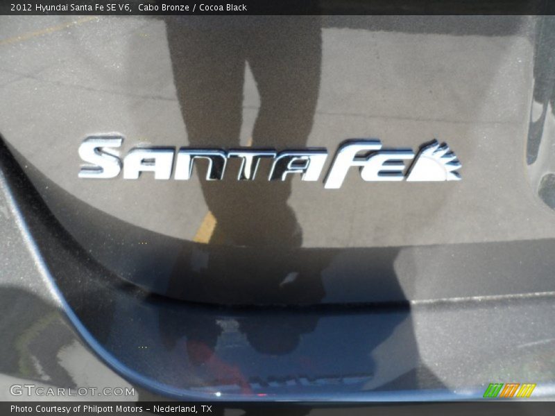  2012 Santa Fe SE V6 Logo