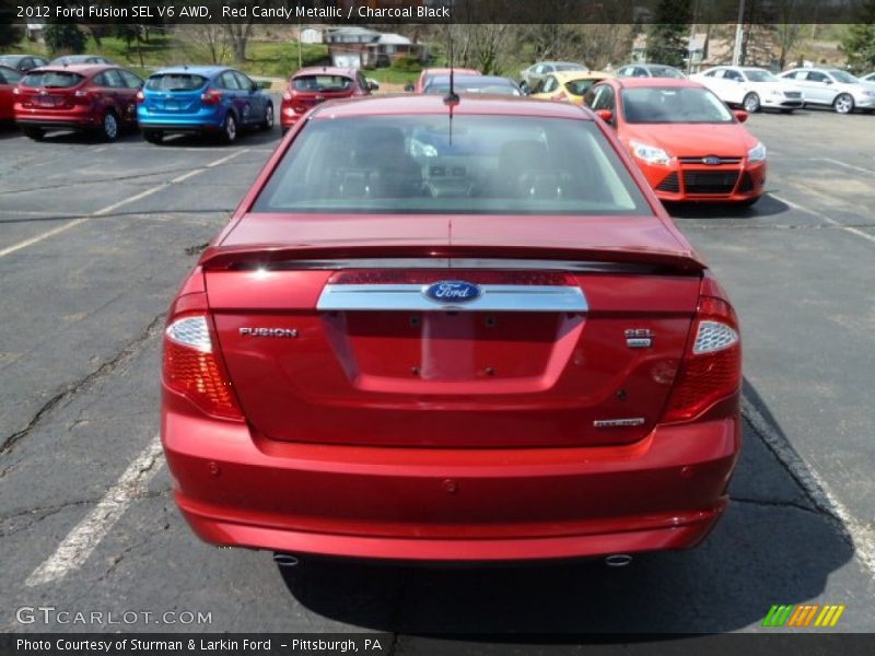 Red Candy Metallic / Charcoal Black 2012 Ford Fusion SEL V6 AWD