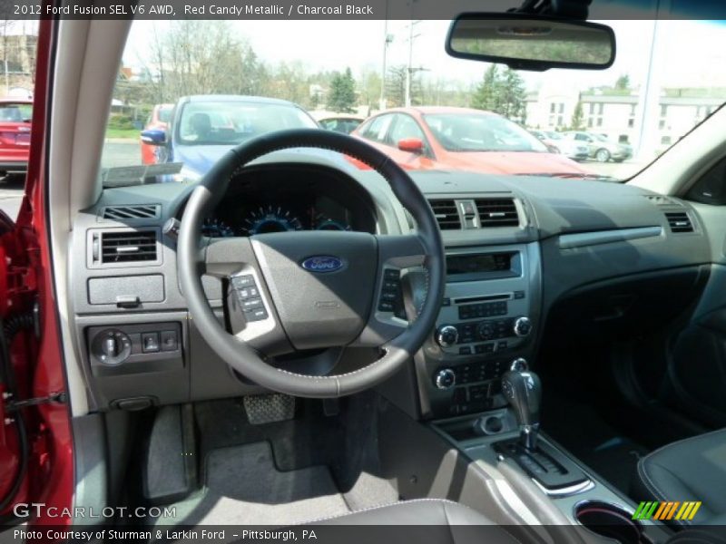Red Candy Metallic / Charcoal Black 2012 Ford Fusion SEL V6 AWD