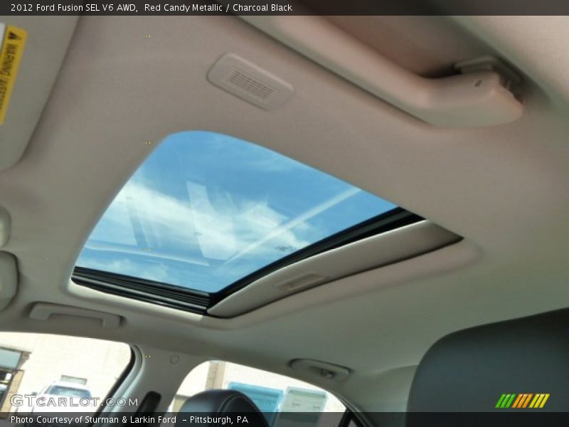 Red Candy Metallic / Charcoal Black 2012 Ford Fusion SEL V6 AWD