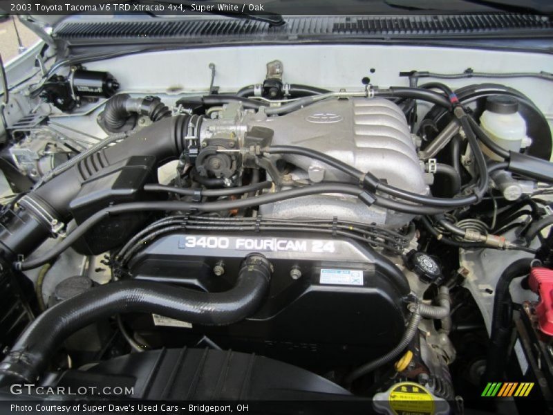 Super White / Oak 2003 Toyota Tacoma V6 TRD Xtracab 4x4