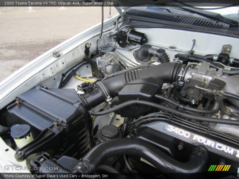 Super White / Oak 2003 Toyota Tacoma V6 TRD Xtracab 4x4