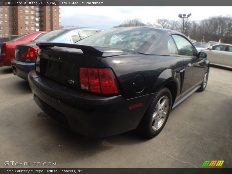 Black / Medium Parchment 2002 Ford Mustang V6 Coupe