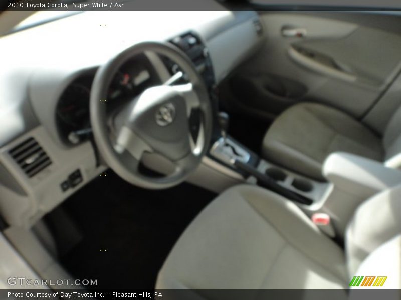 Super White / Ash 2010 Toyota Corolla
