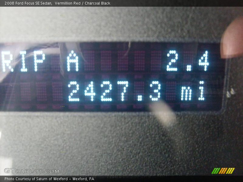 Vermillion Red / Charcoal Black 2008 Ford Focus SE Sedan