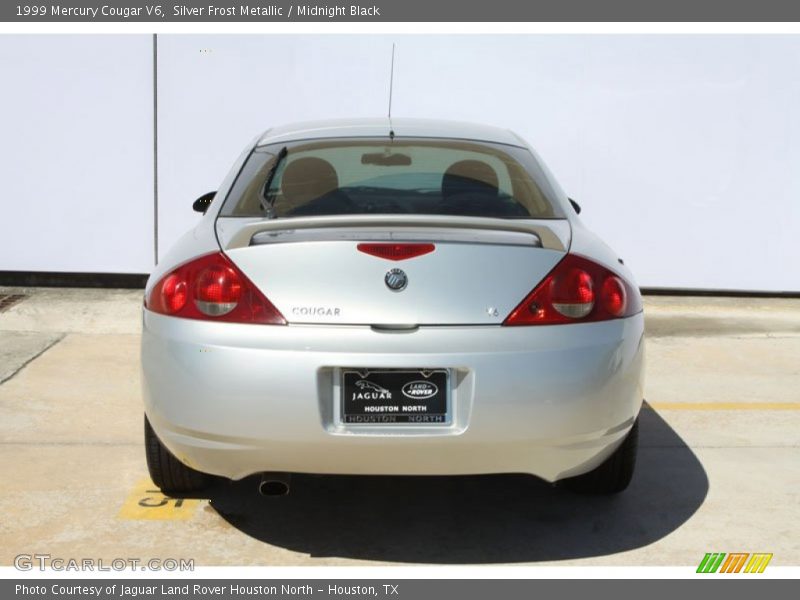 Silver Frost Metallic / Midnight Black 1999 Mercury Cougar V6