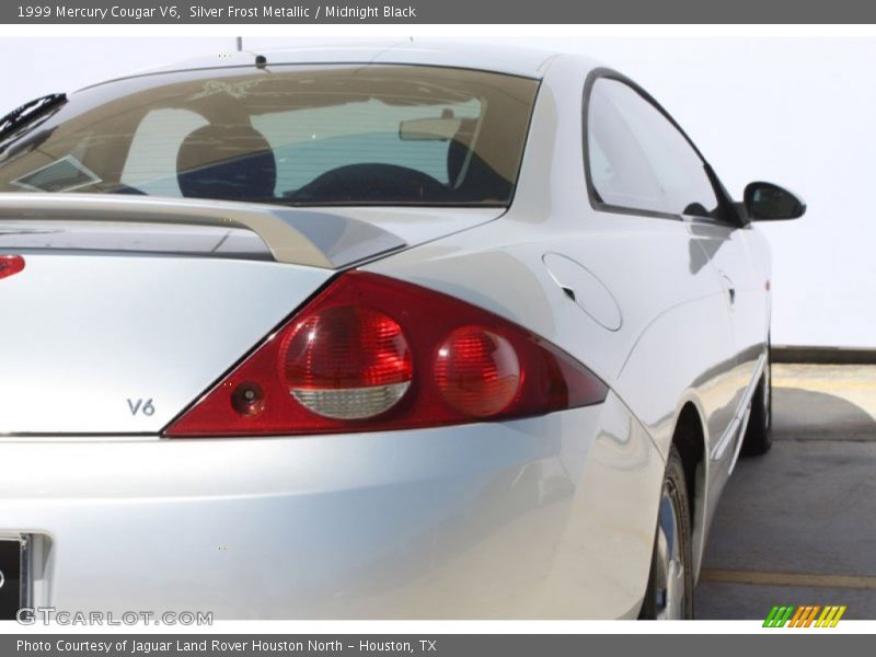 Silver Frost Metallic / Midnight Black 1999 Mercury Cougar V6