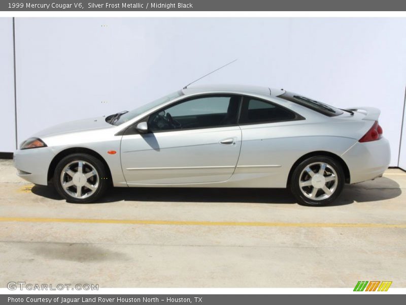 Silver Frost Metallic / Midnight Black 1999 Mercury Cougar V6