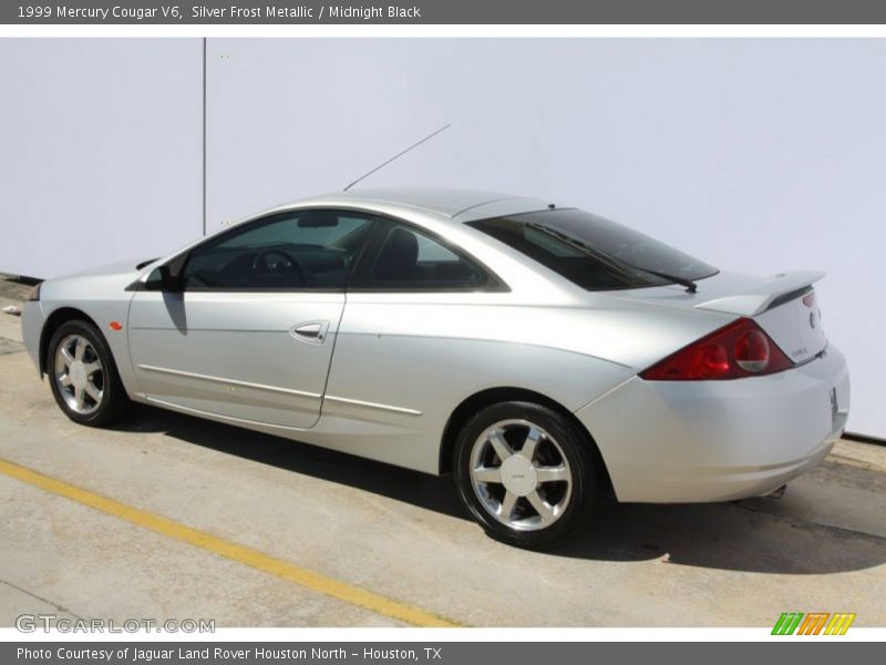 Silver Frost Metallic / Midnight Black 1999 Mercury Cougar V6