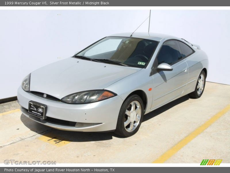 Silver Frost Metallic / Midnight Black 1999 Mercury Cougar V6