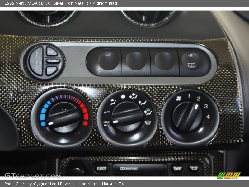 Silver Frost Metallic / Midnight Black 1999 Mercury Cougar V6