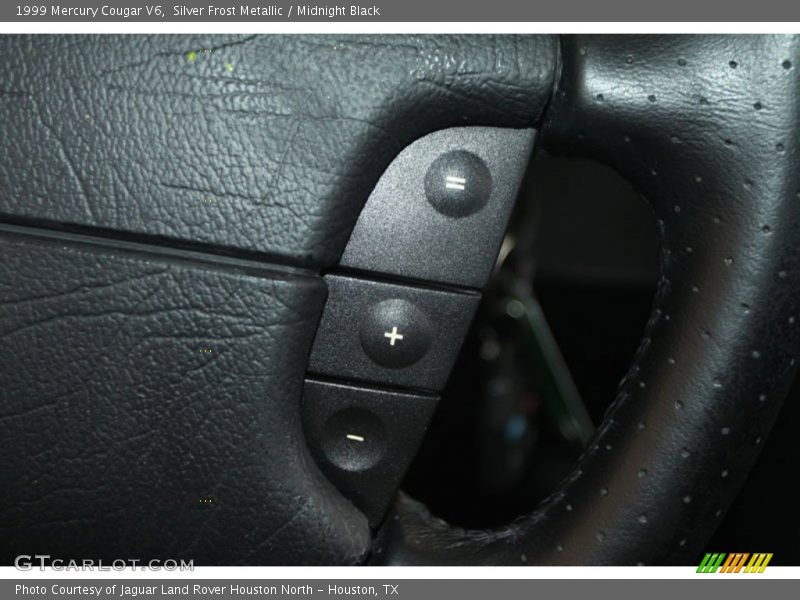 Silver Frost Metallic / Midnight Black 1999 Mercury Cougar V6