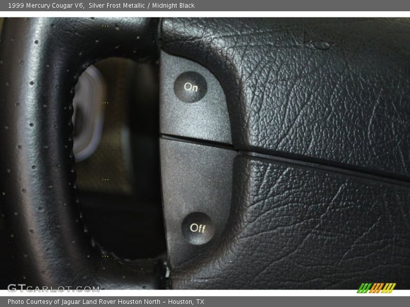 Silver Frost Metallic / Midnight Black 1999 Mercury Cougar V6
