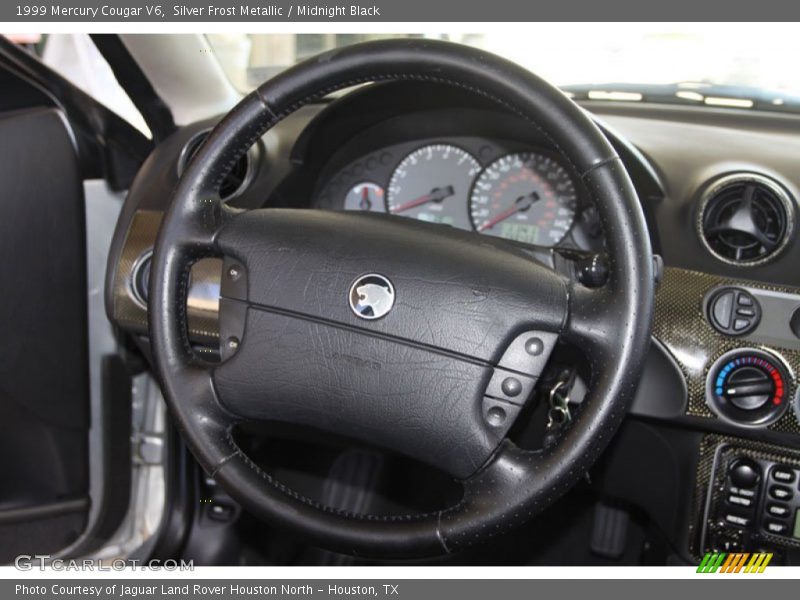 Silver Frost Metallic / Midnight Black 1999 Mercury Cougar V6
