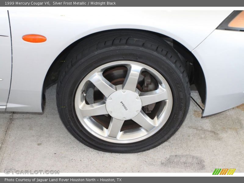 Silver Frost Metallic / Midnight Black 1999 Mercury Cougar V6