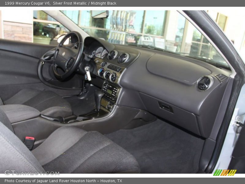 Silver Frost Metallic / Midnight Black 1999 Mercury Cougar V6