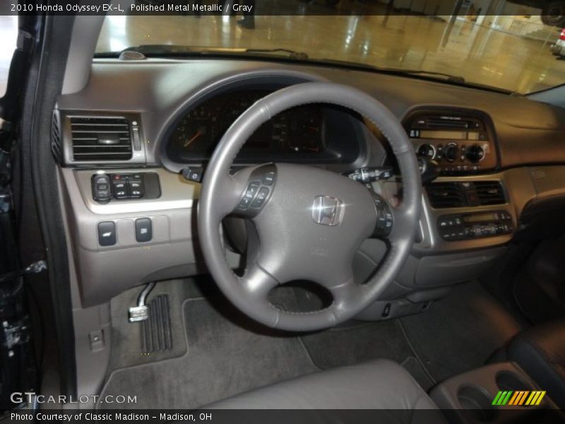 Polished Metal Metallic / Gray 2010 Honda Odyssey EX-L