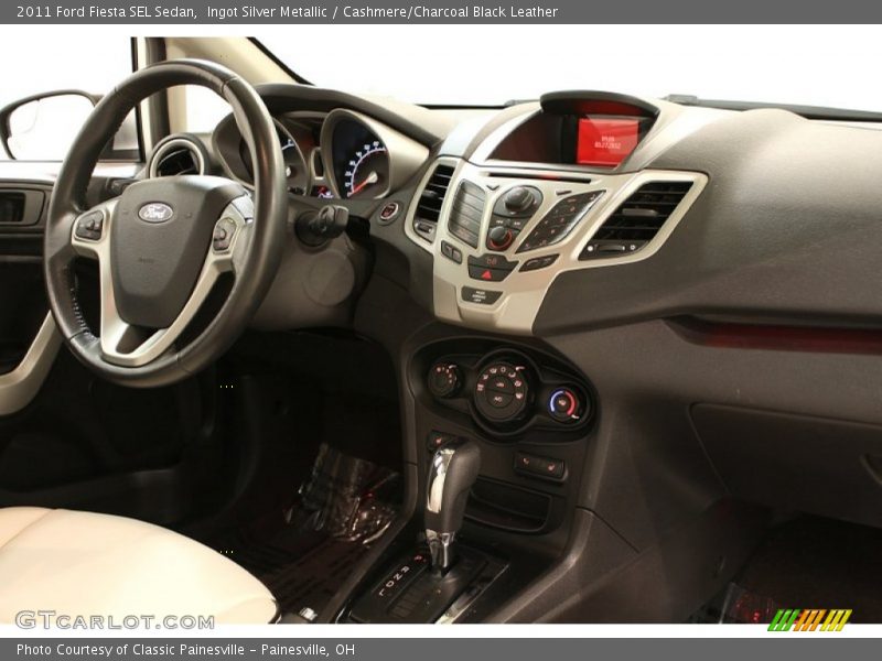 Ingot Silver Metallic / Cashmere/Charcoal Black Leather 2011 Ford Fiesta SEL Sedan