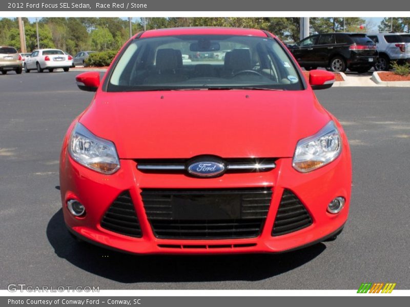 Race Red / Stone 2012 Ford Focus SEL Sedan