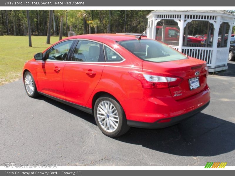 Race Red / Stone 2012 Ford Focus SEL Sedan