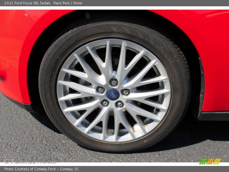 Race Red / Stone 2012 Ford Focus SEL Sedan
