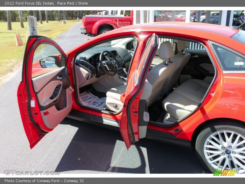 Race Red / Stone 2012 Ford Focus SEL Sedan