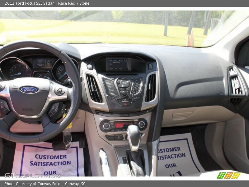 Race Red / Stone 2012 Ford Focus SEL Sedan