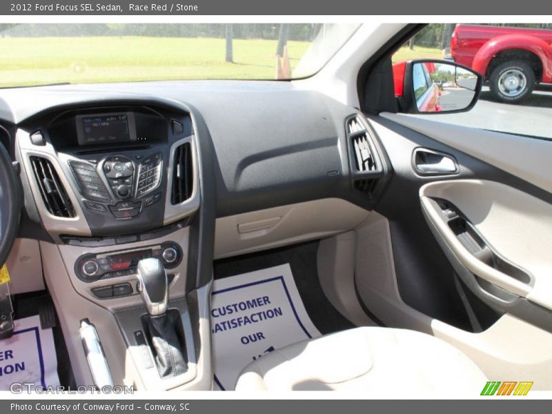 Race Red / Stone 2012 Ford Focus SEL Sedan
