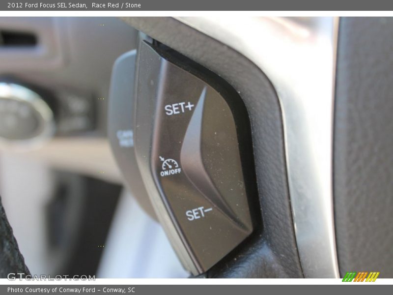 Race Red / Stone 2012 Ford Focus SEL Sedan
