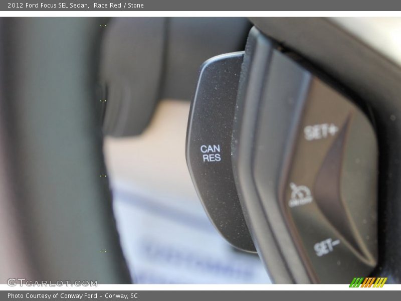 Race Red / Stone 2012 Ford Focus SEL Sedan