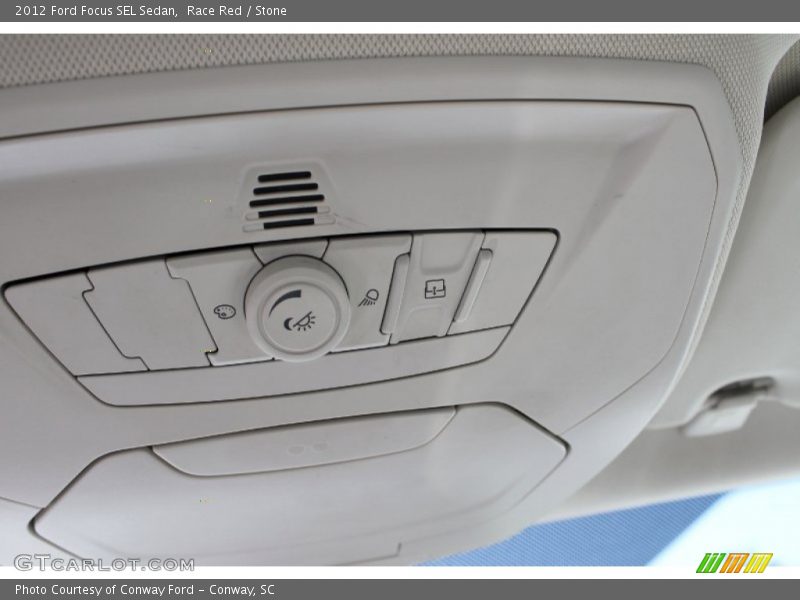 Race Red / Stone 2012 Ford Focus SEL Sedan