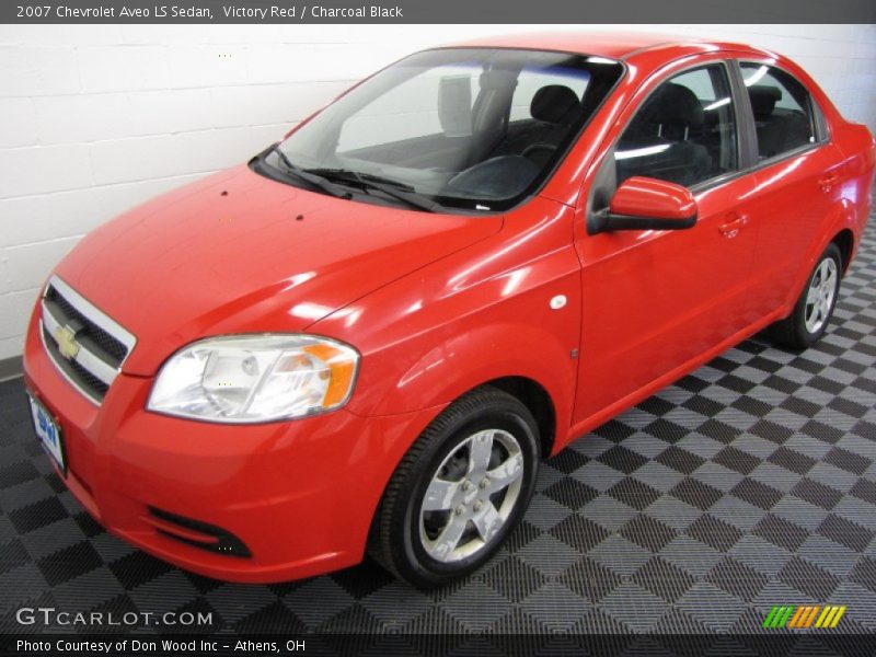 Victory Red / Charcoal Black 2007 Chevrolet Aveo LS Sedan