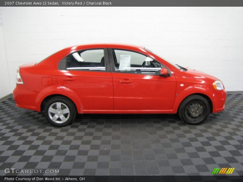Victory Red / Charcoal Black 2007 Chevrolet Aveo LS Sedan