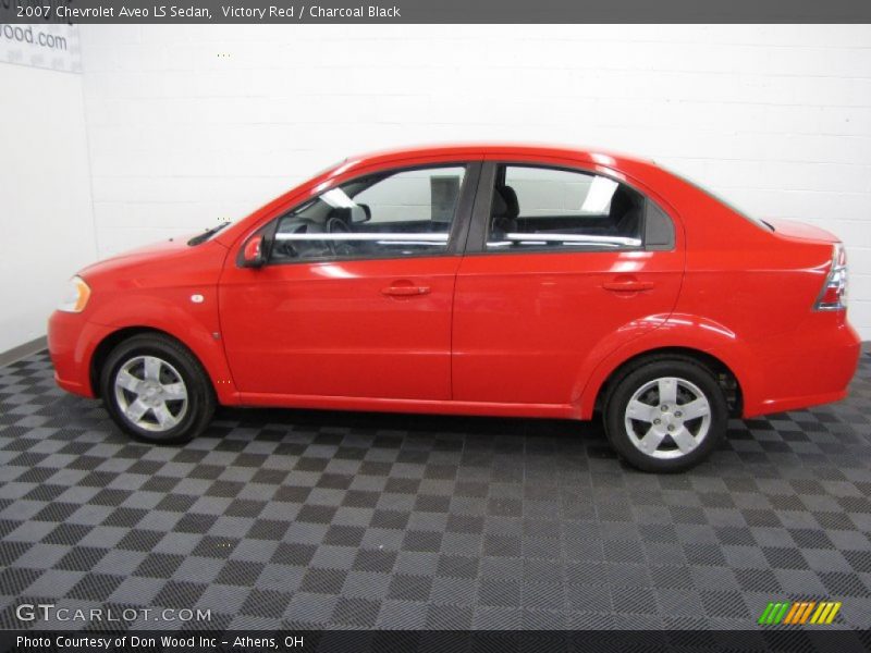 Victory Red / Charcoal Black 2007 Chevrolet Aveo LS Sedan