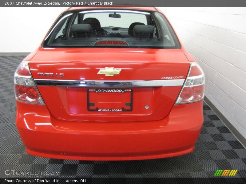 Victory Red / Charcoal Black 2007 Chevrolet Aveo LS Sedan