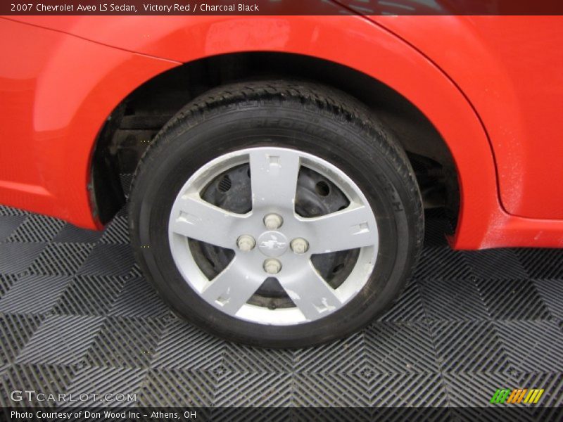 Victory Red / Charcoal Black 2007 Chevrolet Aveo LS Sedan