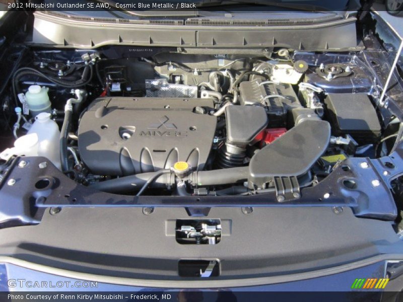 Cosmic Blue Metallic / Black 2012 Mitsubishi Outlander SE AWD