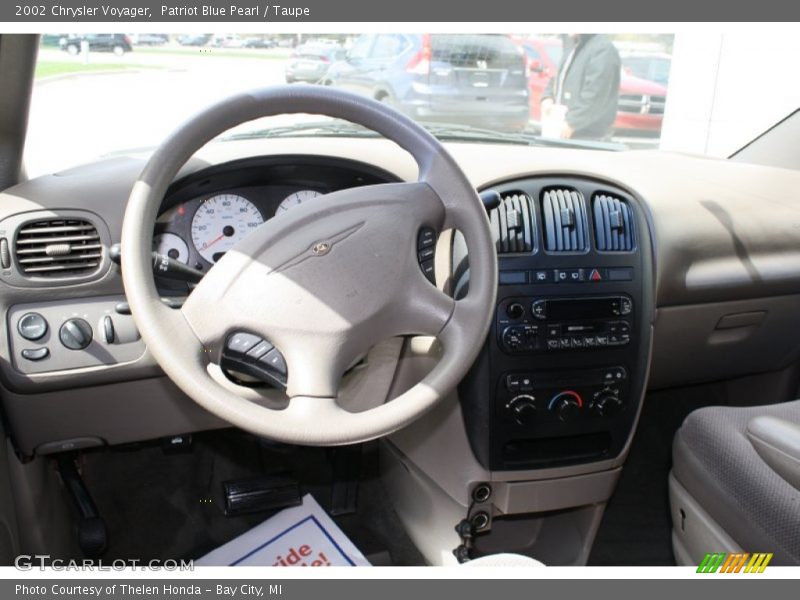 Patriot Blue Pearl / Taupe 2002 Chrysler Voyager