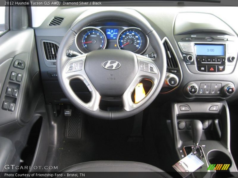 Diamond Silver / Black 2012 Hyundai Tucson GLS AWD