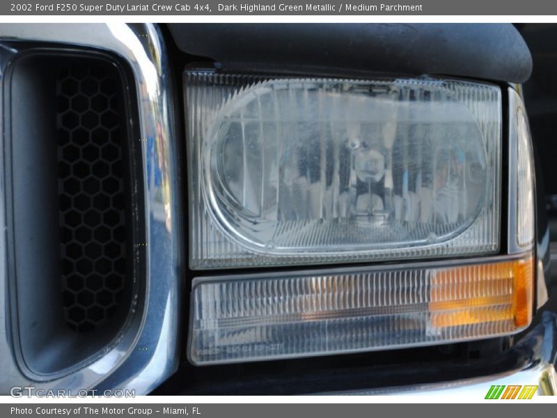 Dark Highland Green Metallic / Medium Parchment 2002 Ford F250 Super Duty Lariat Crew Cab 4x4
