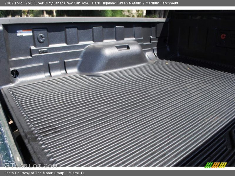 Dark Highland Green Metallic / Medium Parchment 2002 Ford F250 Super Duty Lariat Crew Cab 4x4