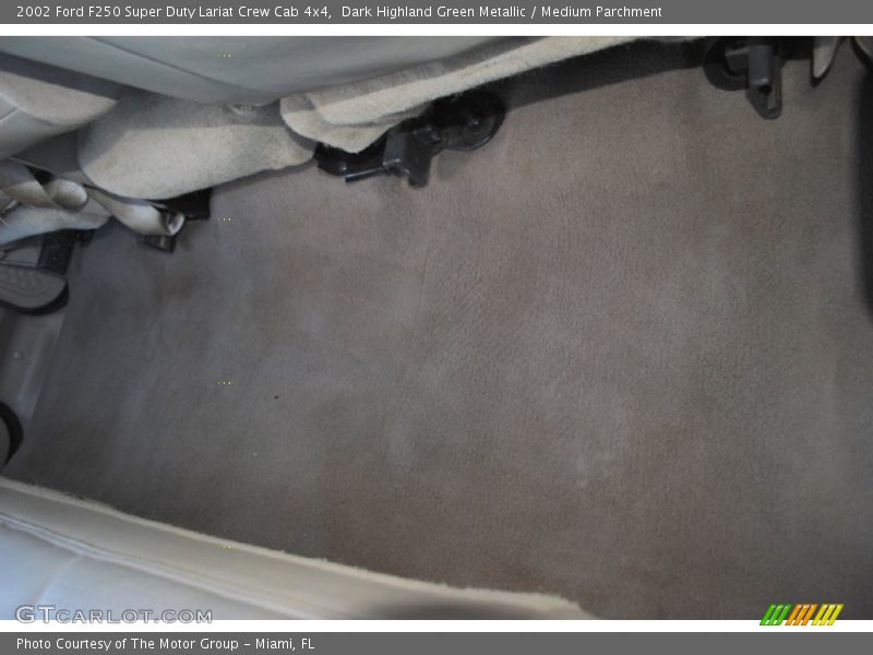 Dark Highland Green Metallic / Medium Parchment 2002 Ford F250 Super Duty Lariat Crew Cab 4x4