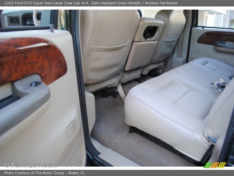 Dark Highland Green Metallic / Medium Parchment 2002 Ford F250 Super Duty Lariat Crew Cab 4x4