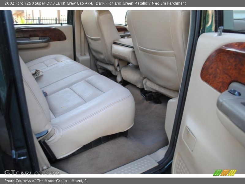 Dark Highland Green Metallic / Medium Parchment 2002 Ford F250 Super Duty Lariat Crew Cab 4x4