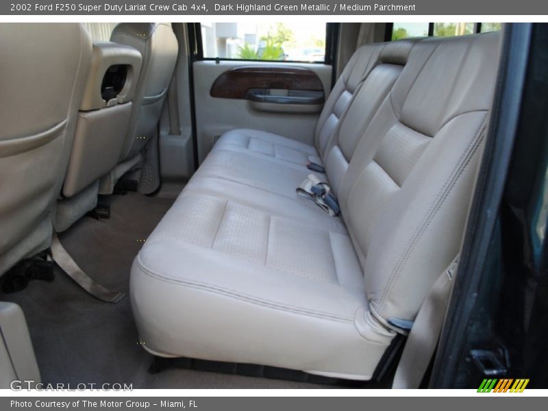 Dark Highland Green Metallic / Medium Parchment 2002 Ford F250 Super Duty Lariat Crew Cab 4x4