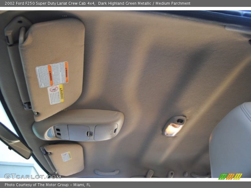 Dark Highland Green Metallic / Medium Parchment 2002 Ford F250 Super Duty Lariat Crew Cab 4x4