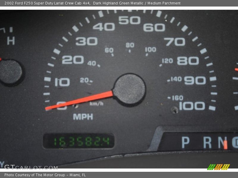 Dark Highland Green Metallic / Medium Parchment 2002 Ford F250 Super Duty Lariat Crew Cab 4x4